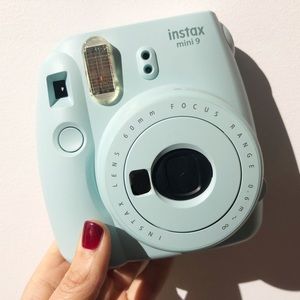Like-new Polaroid camera WITH carrying case + film
